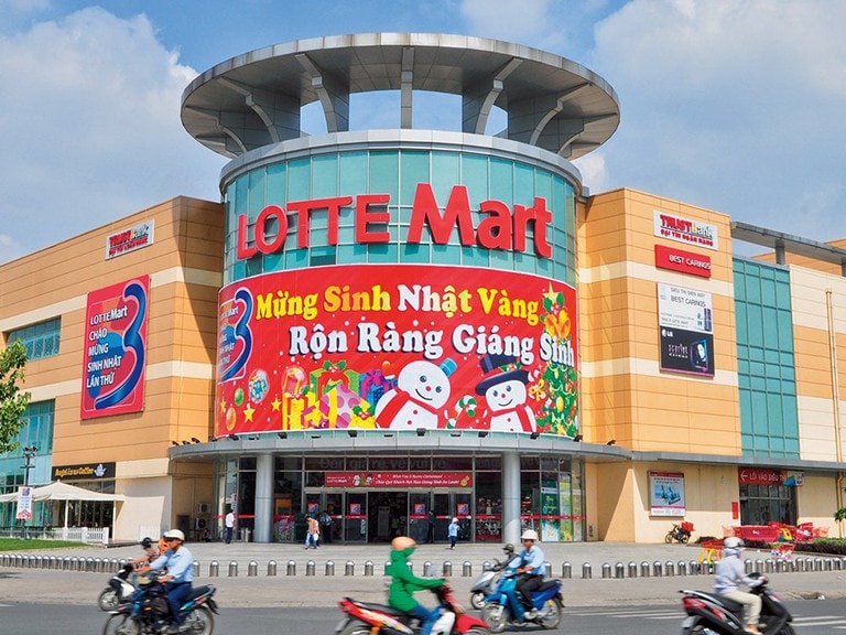 Families shopping and dining at the modern Lotte Mart